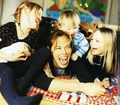 danish mom Aug. 2004 - with all her kids on the table